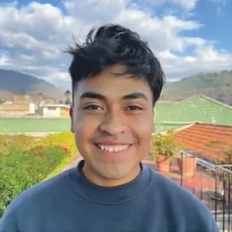 Cloudy outdoor scene of hill and grass