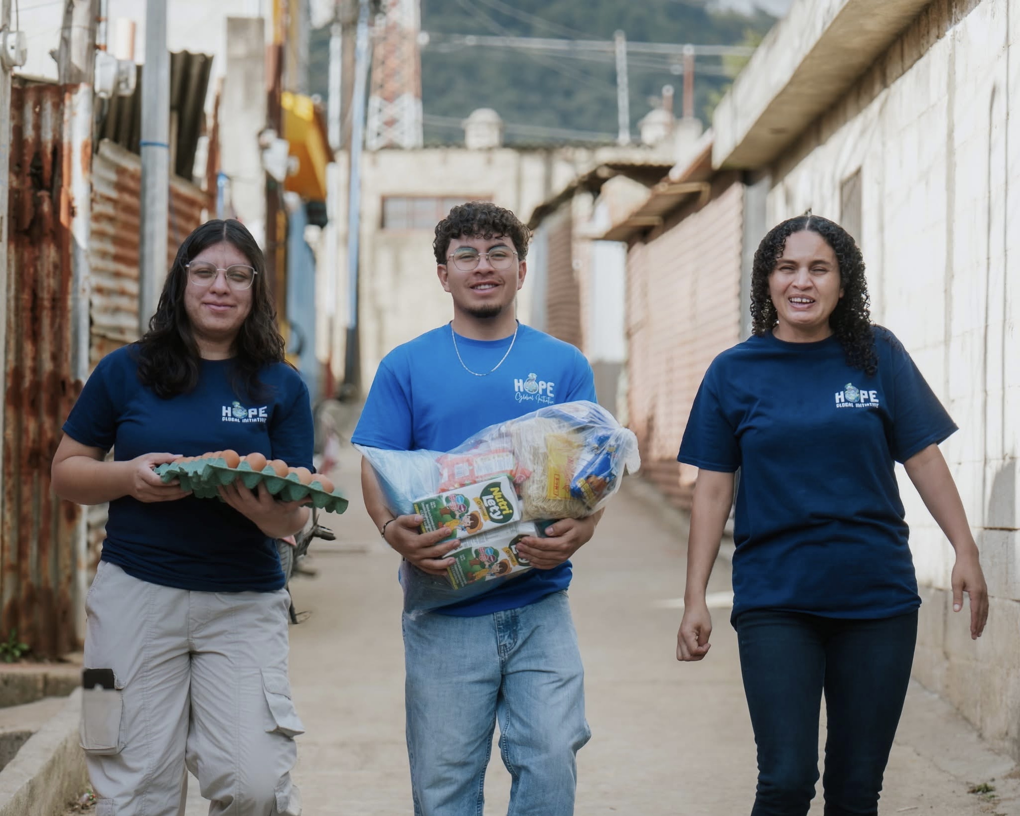 People wearing jeans eat at a speakeasy